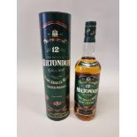 A 70cl bottle of Miltonduff Glenlivet 12 year old whisky, in card tube.