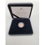 Coins: a 2022 Royal Mint 'The Platinum Jubilee of Her Majesty The Queen Celebration Sovereign',