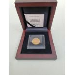 Coins: a Edward VII 1904 gold sovereign, with box.