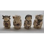 A set of four Japanese bone figural netsukes, 5cm high.