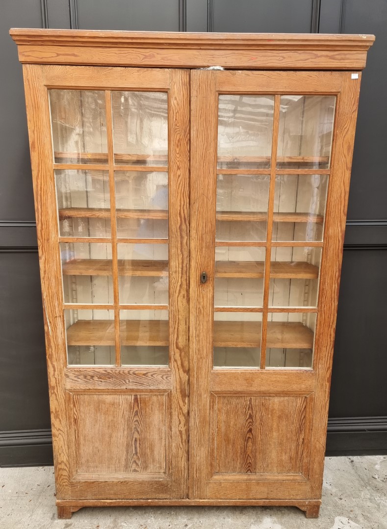 A Victorian pitch pine bookcase, 124cm wide.