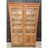 A Victorian pitch pine bookcase, 124cm wide.