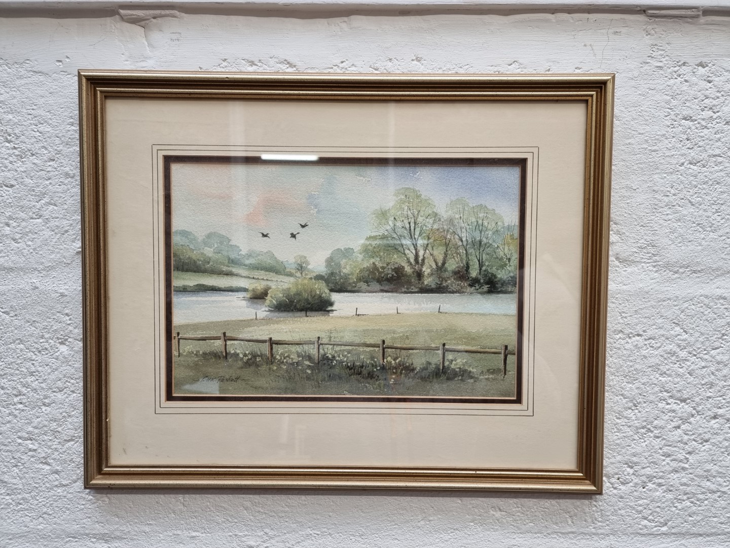 Brian Peskett, landscape with ducks in flight, signed, watercolour, 20 x 29.5cm.