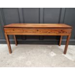 A mid-century rosewood side table, 152.5cm wide.