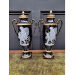 A pair of reproduction continental porcelain pate sur pate twin handled vases, 41cm high, (