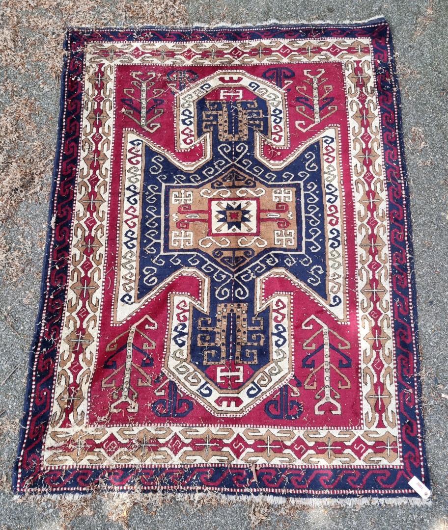 An old Karabakh rug, 198 x 148cm.
