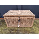 An antique wicker hamper, with ticking liner, possibly Oriental, 47cm wide.