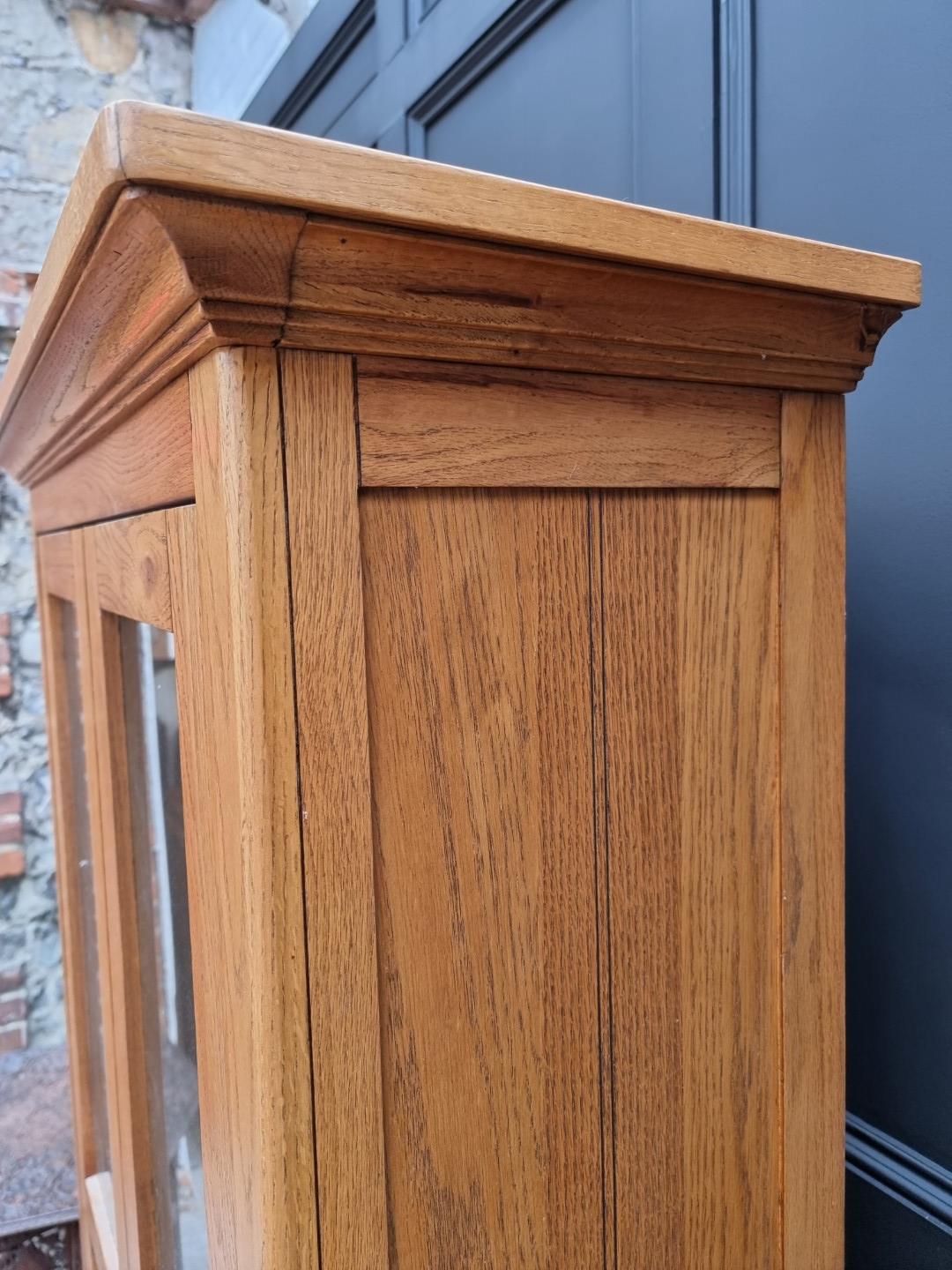 A contemporary oak bookcase, 90cm wide. - Image 8 of 10