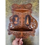 A small Sorrento ware hanging corner shelf, 36cm high.