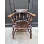 A 19th century ash, beech and elm smokers bow chair.