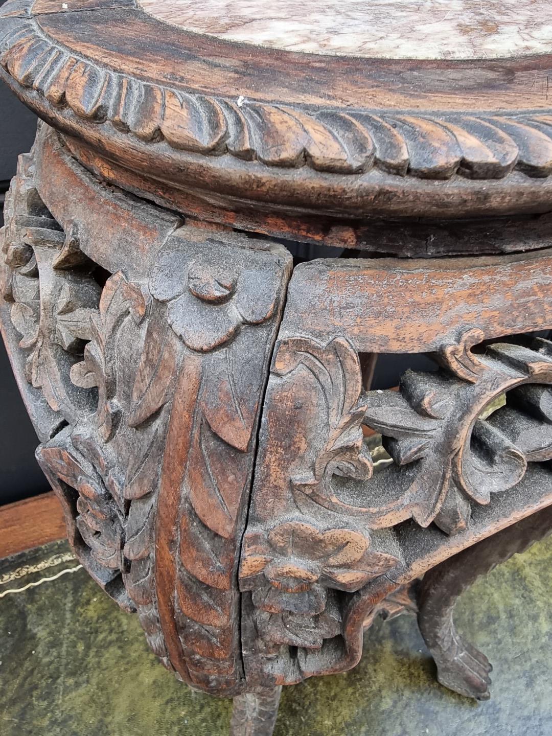 A Chinese carved hardwood and marble inset jardiniere stand, 61.5cm high. - Image 7 of 9