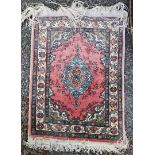 A small silk prayer rug, having central medallion, 58 x 48cm.