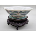 An interesting Chinese famille verte 'Ten Views of Jiangxi Provence' lozenge bowl, Jiaqing/Daoguang,