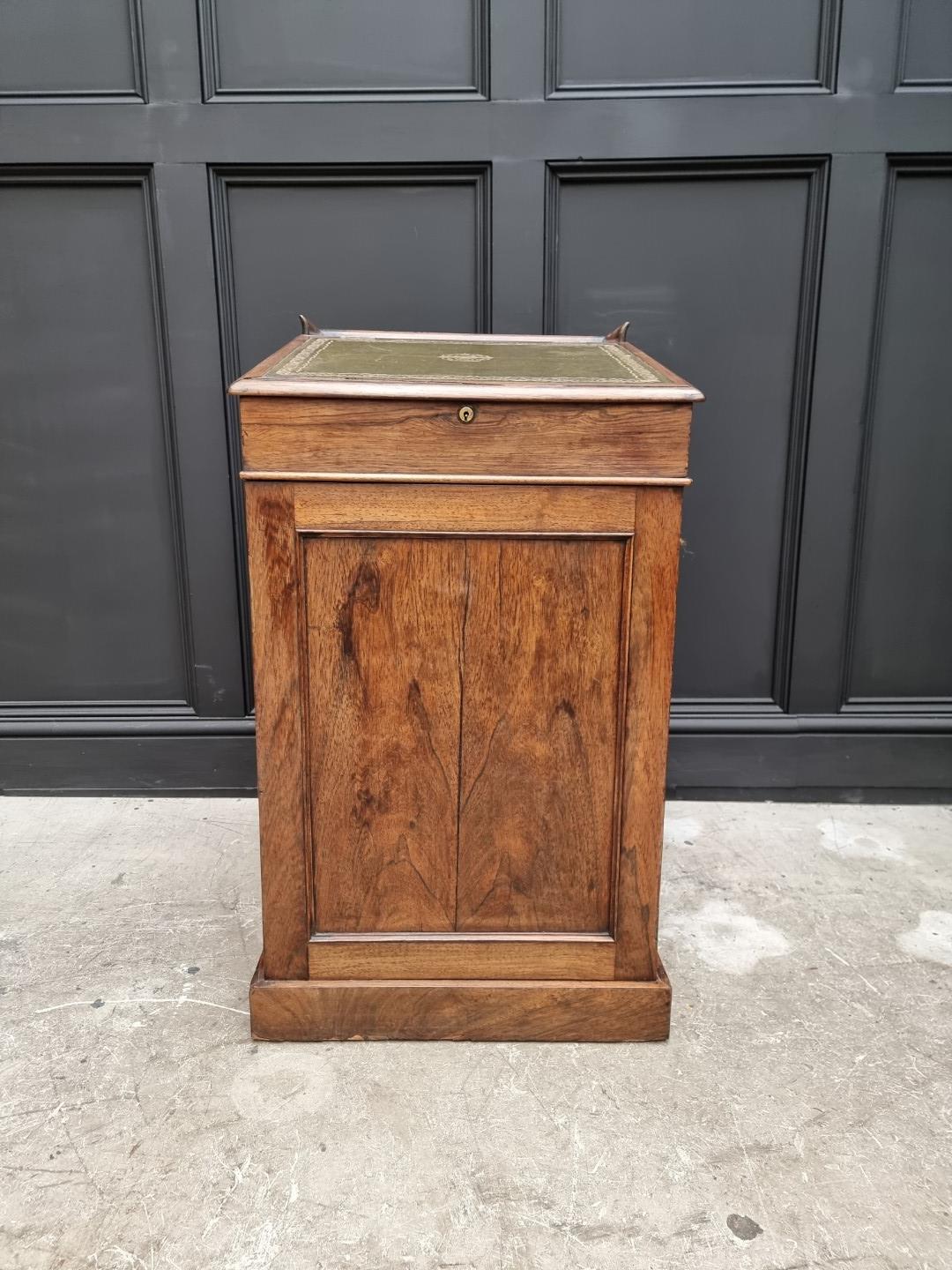 An early 20th century rosewood Davenport, 51cm wide.