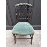 A 19th century ebonized side chair.