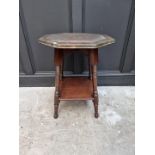 A circa 1900 mahogany and hammered copper octagonal occasional table, 52cm wide.