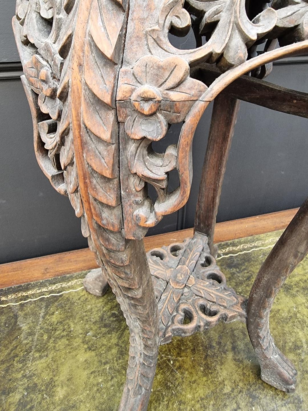 A Chinese carved hardwood and marble inset jardiniere stand, 61.5cm high. - Image 8 of 9