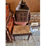 An Edwardian inlaid corner chair; together with a small carved oak corner cupboard and a mahogany