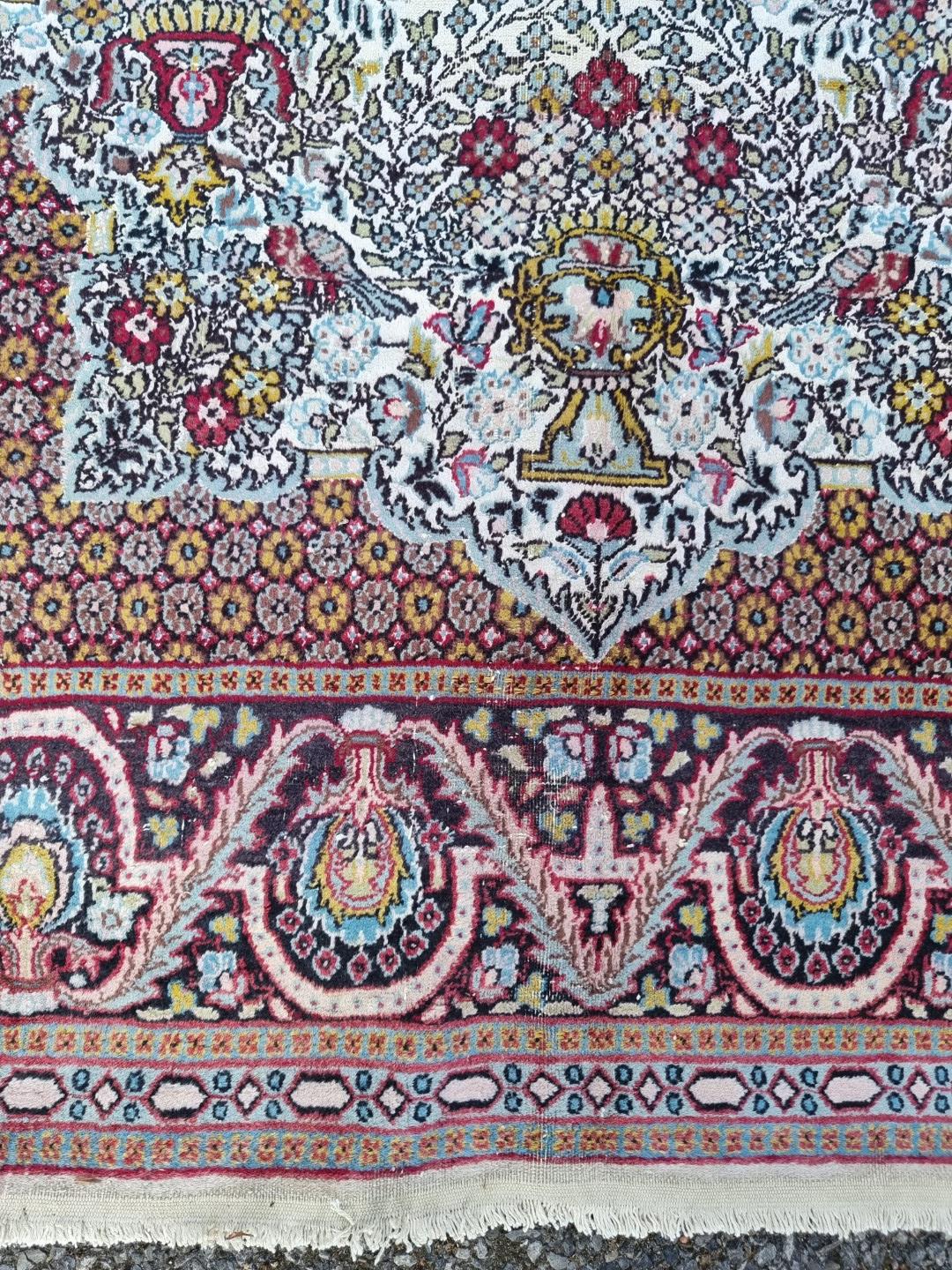 A part silk Tehran rug, having urn and bird decoration to central field, with floral borders, 186 - Image 3 of 7