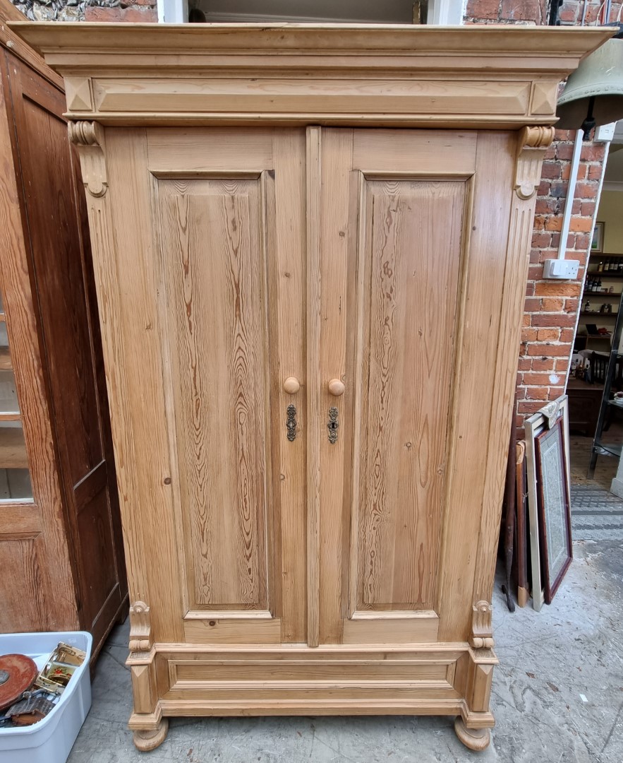 A late 19th century Continental pine armoire, 118cm wide.