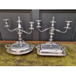 A pair of Old Sheffield plate twin branch candelabra, 36cm high; together with two EPNS entrée