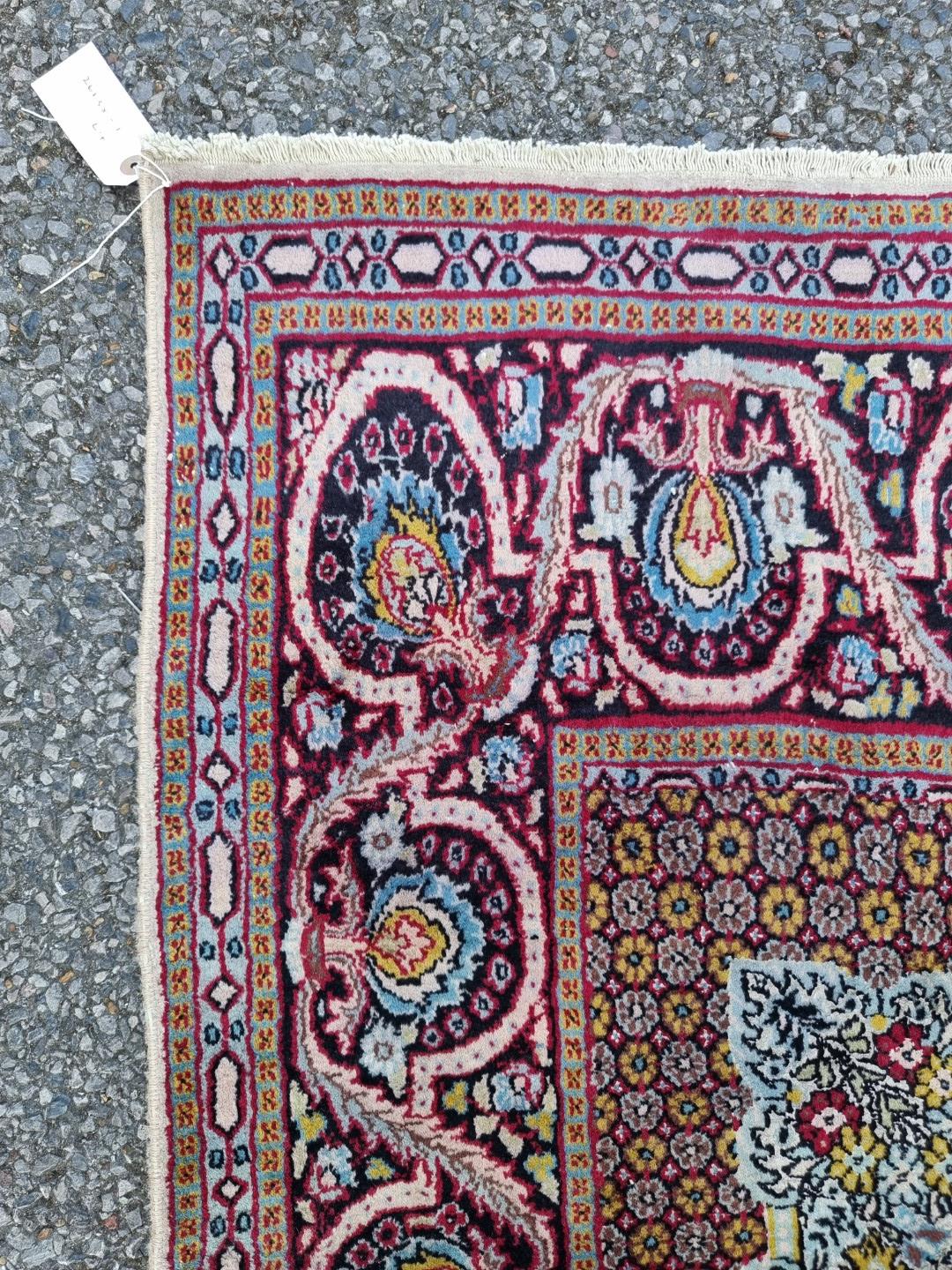A part silk Tehran rug, having urn and bird decoration to central field, with floral borders, 186 - Image 5 of 7