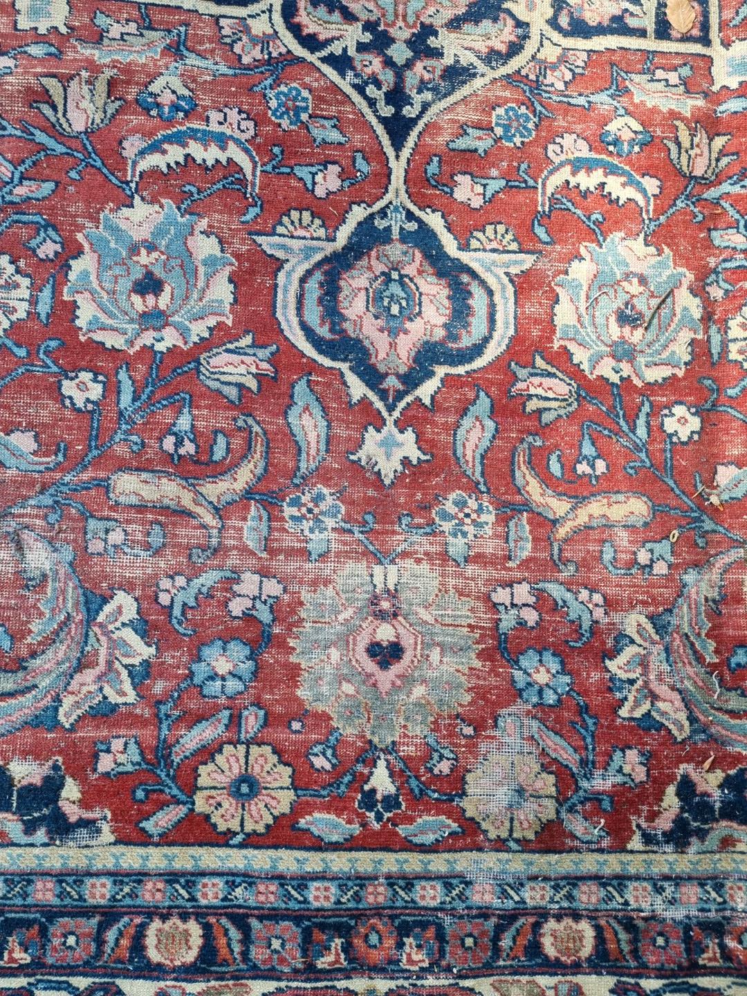 A Persian carpet, having central floral medallions, with floral cartouches to each corner of central - Image 4 of 10