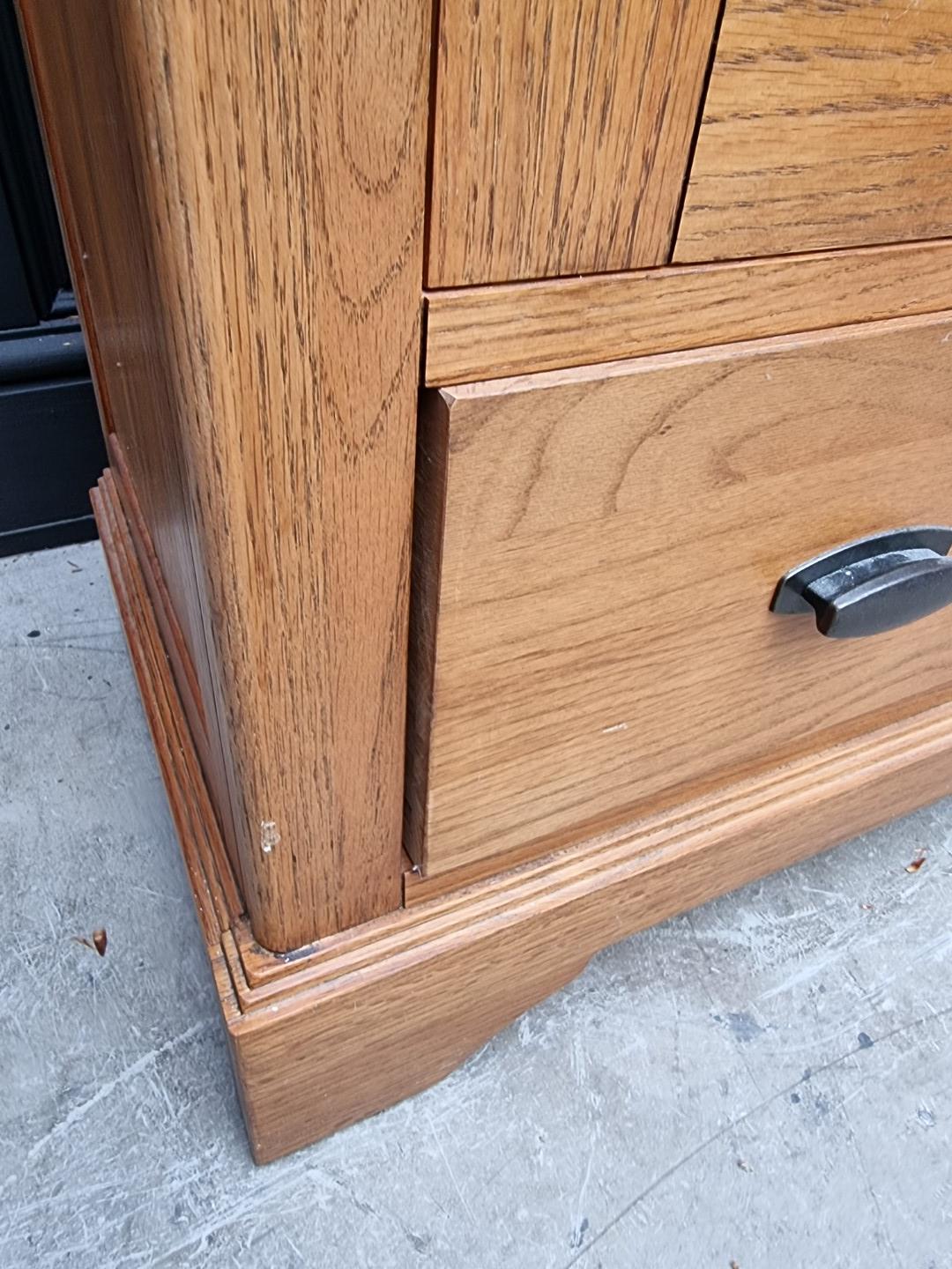 A contemporary oak bookcase, 90cm wide. - Image 4 of 10