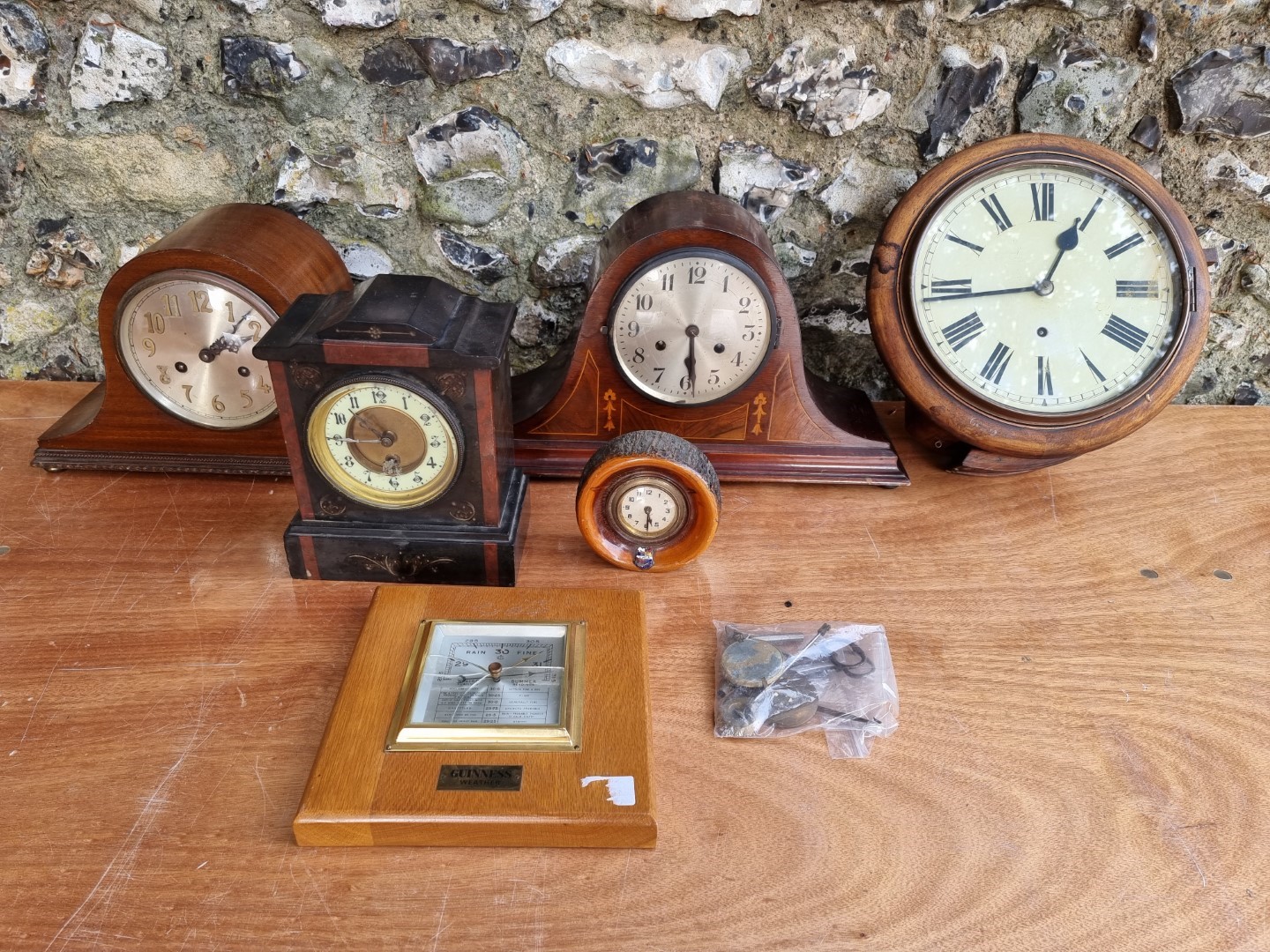 A quantity of clocks, to include a slate mantel clock.