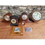 A quantity of clocks, to include a slate mantel clock.