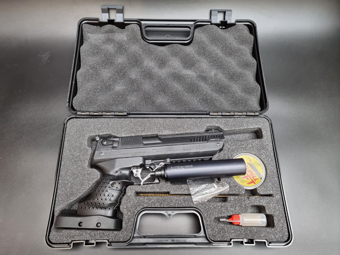 A Webley Alecto MkV .177 cal air pistol, in fitted box; with accessories and an A-Tec Wave .22