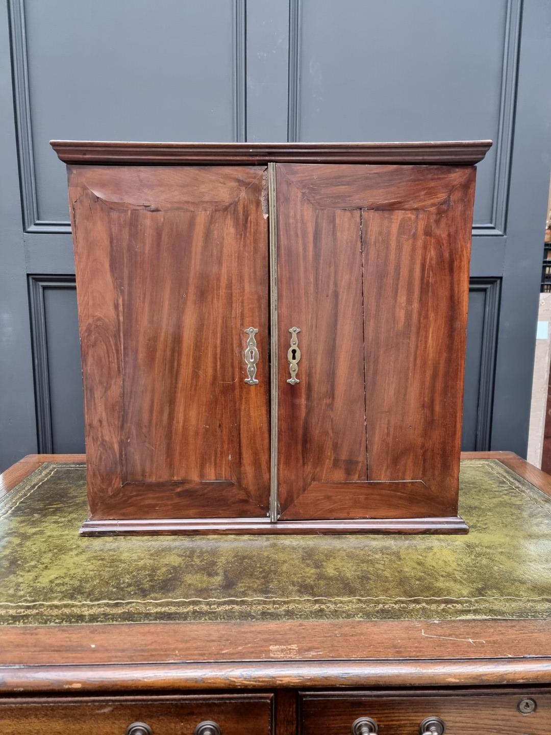 An 18th century mahogany table cabinet, enclosing pigeonholes and small drawers, 61cm high x 64. - Image 2 of 9