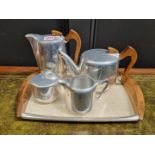 A Picquot ware four piece teaset and tray.