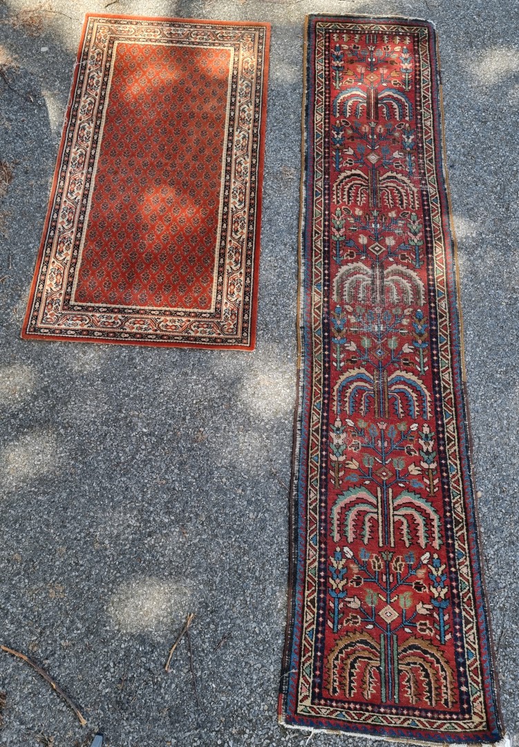 A Persian runner, having tree design to central field, with geometric borders, 277 x 60cm;
