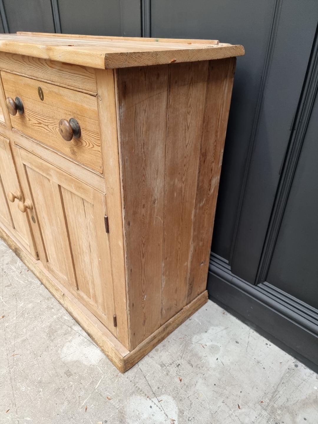 An old pine side cabinet, 128cm wide. - Image 9 of 13