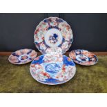 Four Japanese Imari plates, largest 31cm diameter.