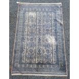 A Bokhara rug, having repeated design, 192 x 126cm.