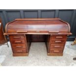 An antique mahogany rolltop desk. (a.f.)