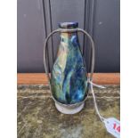 A Heliosine pottery iridescent lustre and pewter mounted vase, 15.5cm high.