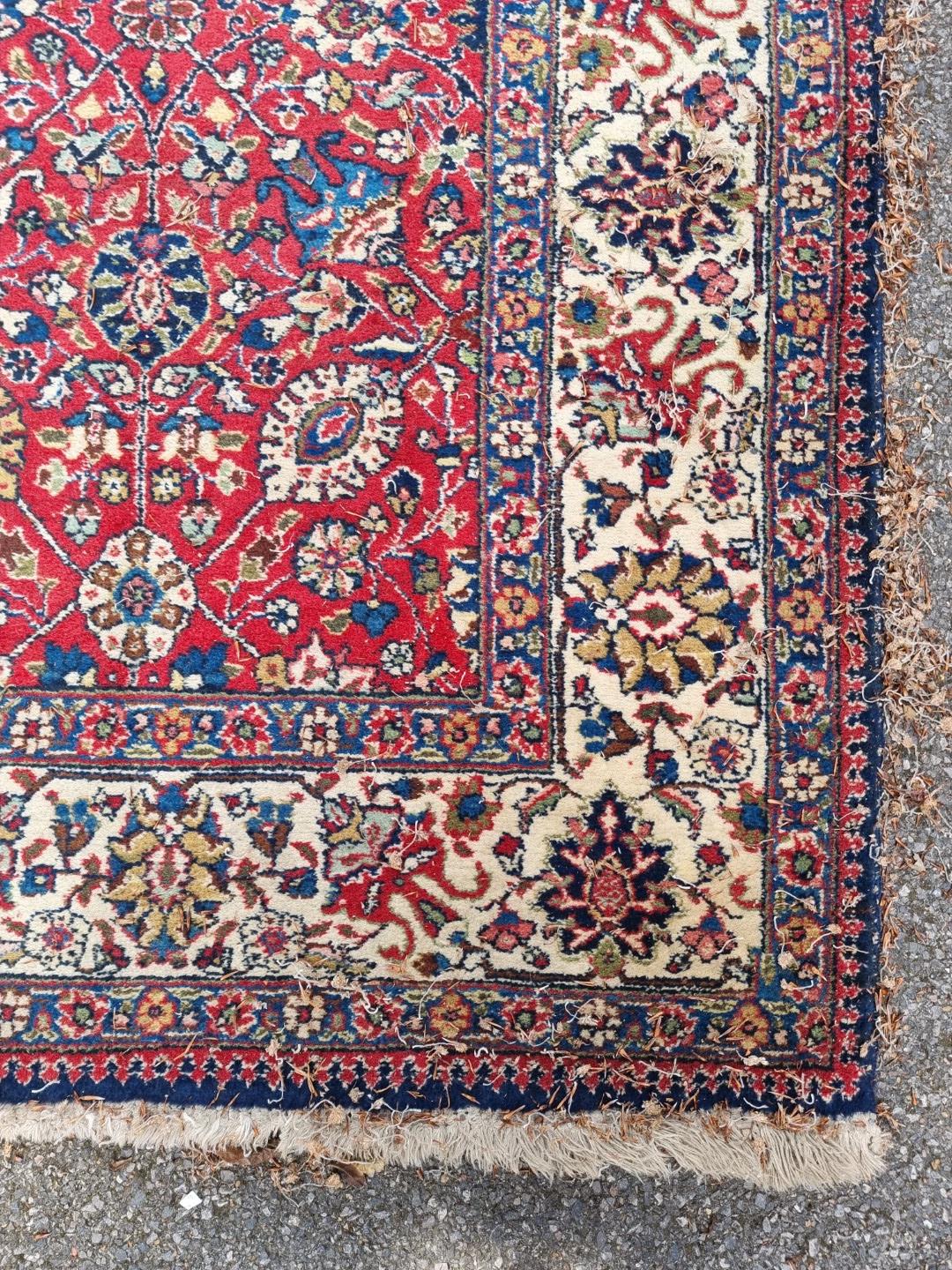 A Persian carpet, having allover floral decoration to central field, with floral borders, 295 x - Image 2 of 6