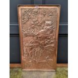 A copper rectangular plaque, repousse decorated with an Oriental scene, 74 x 43cm.