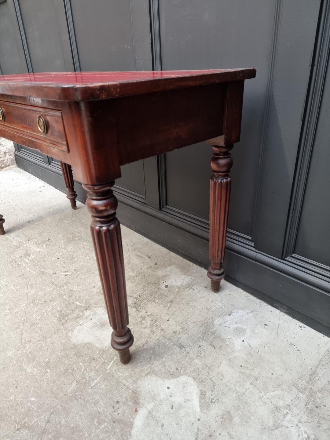 A 19th century mahogany desk, stamped 'M Willson, Great Queen St', 120.5cm wide. - Image 8 of 10