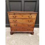 A small George III mahogany and crossbanded four drawer chest, with brushing slide, 87cm wide.