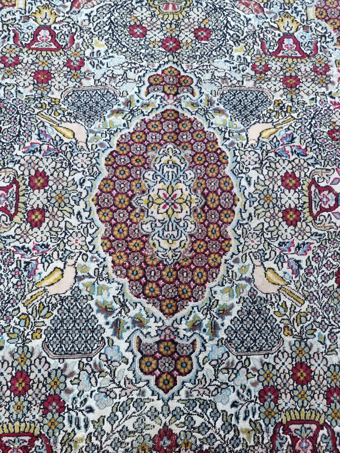 A part silk Tehran rug, having urn and bird decoration to central field, with floral borders, 186 - Image 4 of 7