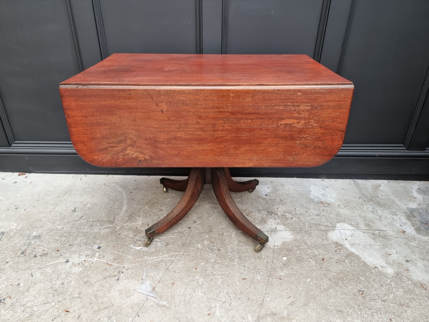 A George IV mahogany pedestal Pembroke table, 108.5cm wide when open.