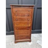 A late Victorian mahogany and satinwood crossbanded Wellington chest, 60.5cm wide.