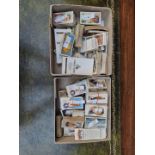 A large collection of cigarette cards, some incomplete sets.