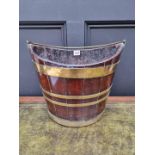 A George III mahogany and brass bound peat bucket, with swing handle, 37.5cm wide.