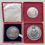 Medals: a Victoria 1897 Diamond Jubilee silver medal, boxed; and two others.