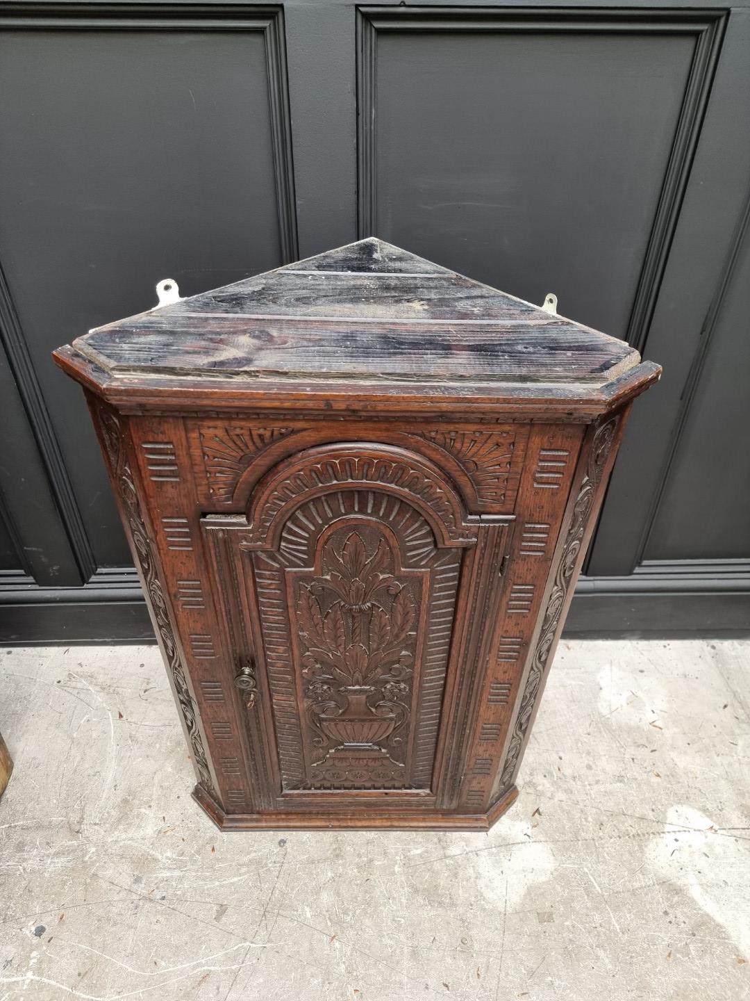 A George III oak and mahogany crossbanded hanging corner cupboard, 107.5cm high x 92cm wide; - Image 2 of 8